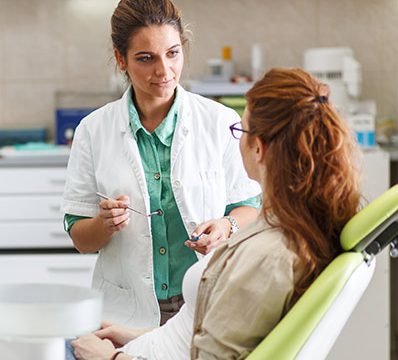 doctor talks to patient