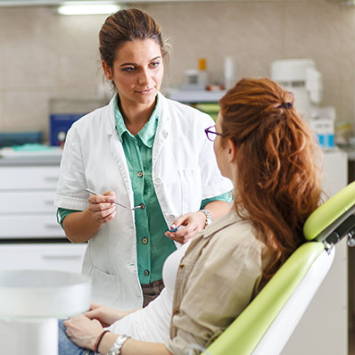 doctor talks to patient